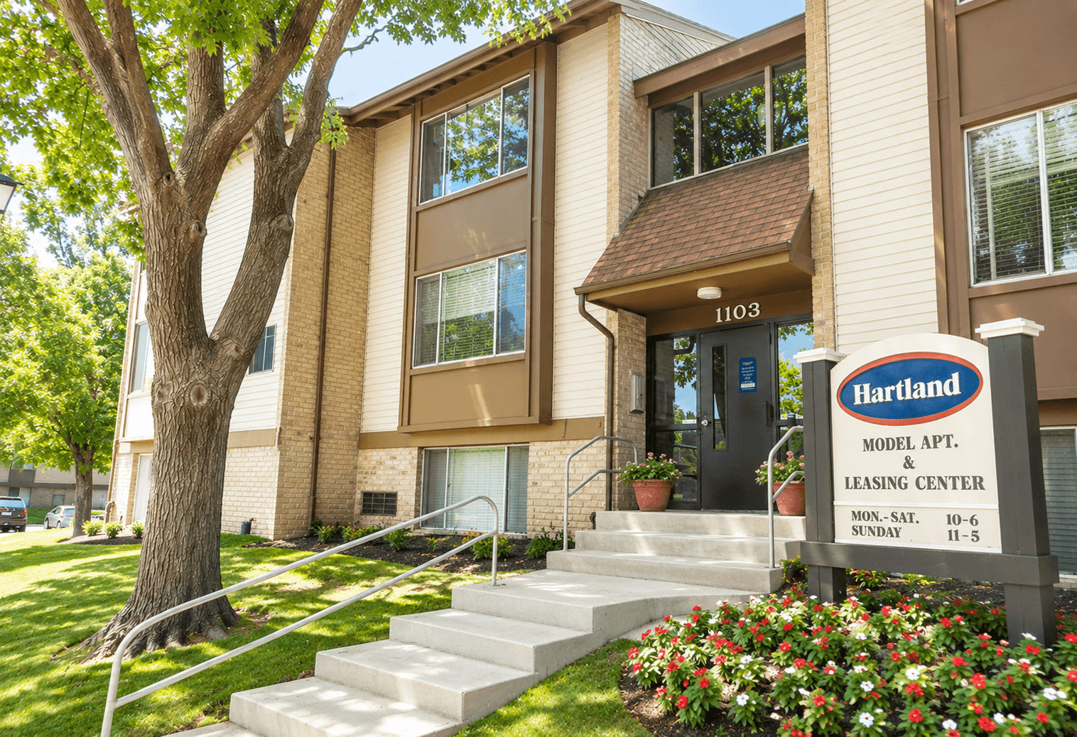 A Hartland sign is in front of a building.